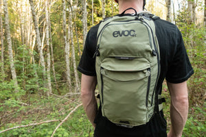 Freehub Magazine product reviewer wearing EVOC Stage hydration backpack