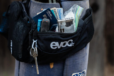 The Radavist photo: EVOC Race Belt side pocket unzipped showing contents